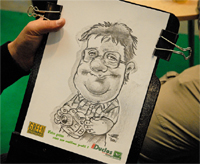 caricaturiste pour dessin en live sur un stand pour l'animation d'un salon professionnel